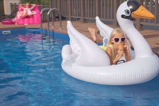 Eating Ice Cream while Lying on a Swan Floatie